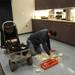 Northern Vending employee Charlie Gregory sorts pieces as he installs a coffee maker in a kitchen area in the new Barracuda Networks in downtown Ann Arbor on Thursday. Melanie Maxwell I AnnArbor.com